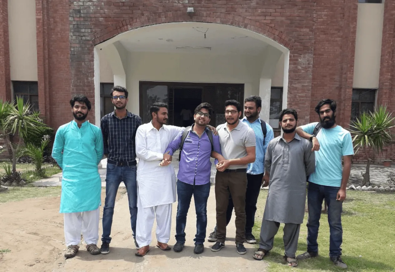 Abdul Mateen with classmates and peers